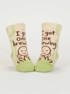 The Camera Loves Me/ I Got One Brewing Baby Socks