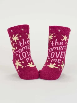 The Camera Loves Me/ I Got One Brewing Baby Socks