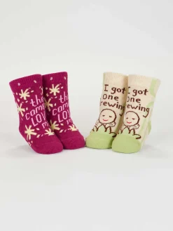 The Camera Loves Me/ I Got One Brewing Baby Socks